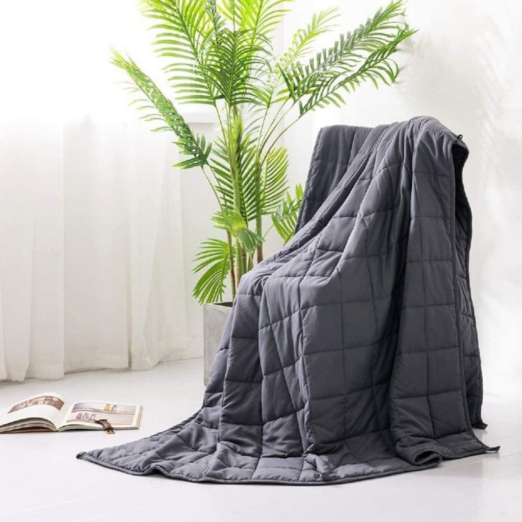 Syrinx Cooling Weighted Blanket on chair